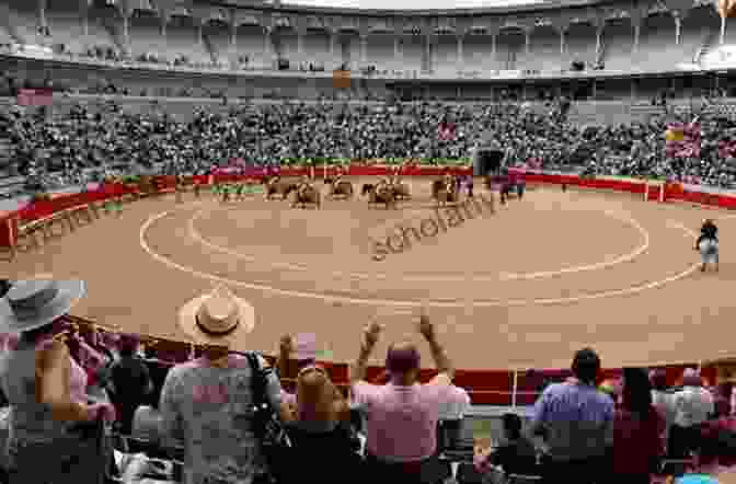 A Crowd Watches A Bullfight In A Packed Bullring Into The Arena: The World Of The Spanish Bullfight