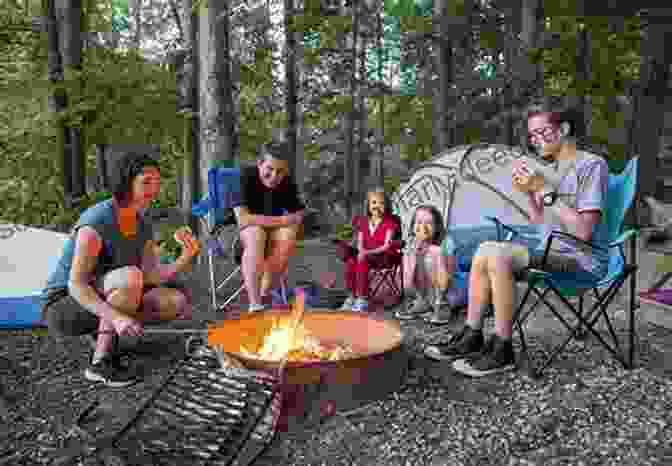 A Family Sitting Around A Campfire Outside Their RV Life On 2 Wheels (Life On 2 Wheels Part 3 Out Of 3 North America Until The End)